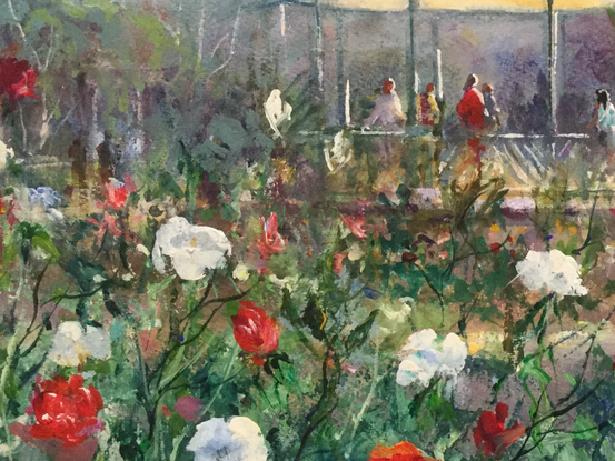 Park pavilion seen through a riot of colour from the flowers . Soft background to enhance the perspective in this work