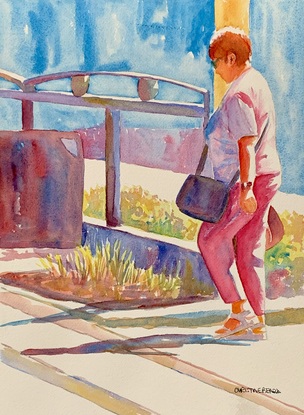 Woman walking in the sunshine.