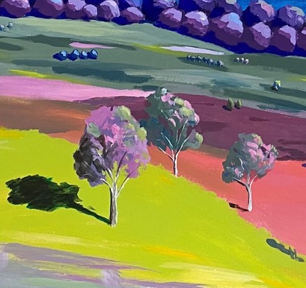 Colourful trees amongst colourful pastures with pops of pink and light green and distant glimpse of ocean under blue sky with a few puffy white clouds. 