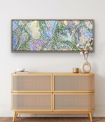 A large colourful Statement piece where the leaves and petals dance across the canvas as though caught in the breeze. There are patterns and courses of movement across the canvas that inspire happiness and smiles. if you have a love of nature and abstract this is a combination for you.