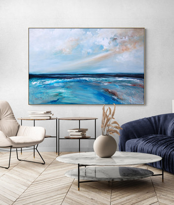 Abstract seascape in grey blue  and teal with mountain range in the horizon under a dramatic cloudy sky.