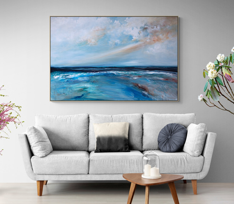 Abstract seascape in grey blue  and teal with mountain range in the horizon under a dramatic cloudy sky.