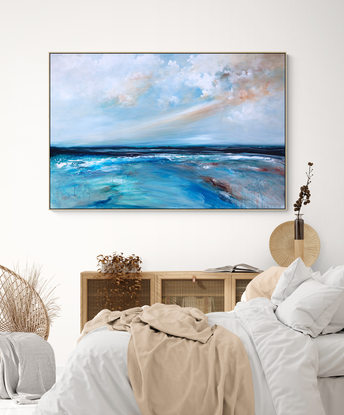 Abstract seascape in grey blue  and teal with mountain range in the horizon under a dramatic cloudy sky.