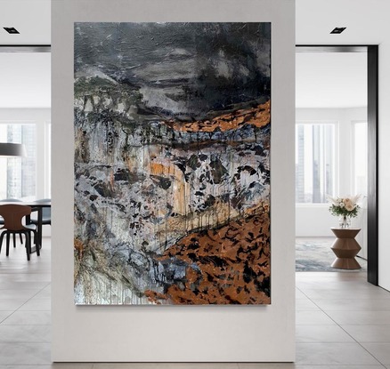 A large abstract landscape with black, white, copper and ochre