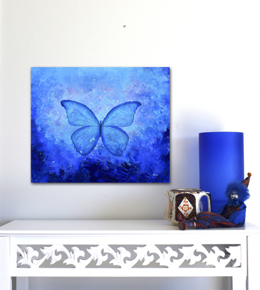 Painting of a Blue Morpho Butterfly on a blue abstract background.