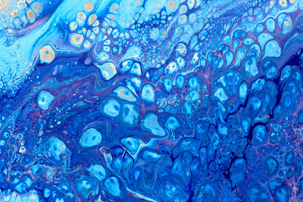 ABSTRACT painting that gives the impression of soothing ocean waves lapping in to soft sandy shore.  
The blues are bright. The sandy shore is soothing
The intricate mosaic pattern within the tonal blue hues and the glimmering adds added interest and intrigue the close one gets to the painting. Metallics add an extra depth because the painting changes personality when one views from different angles.