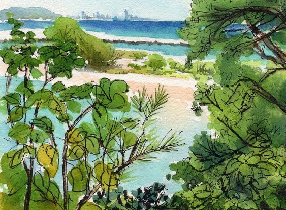 Looking through trees to the distant river and ocean of Currumbin and the Gold Coast beaches.