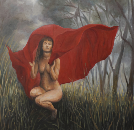 Women with red cape in the Australian bush.