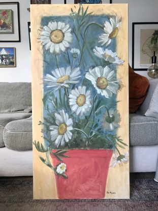 Oversize white daisies in a red pot plant,  on a blue and sienna background 