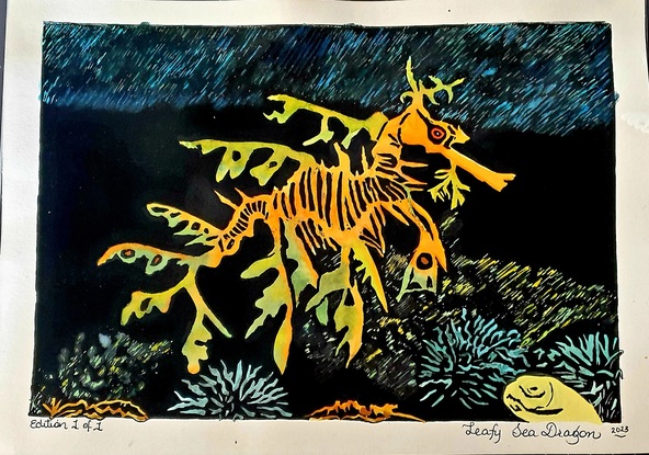 Lino cut print of a Leafy Sea Dragon, finished with water colours and pencil. 