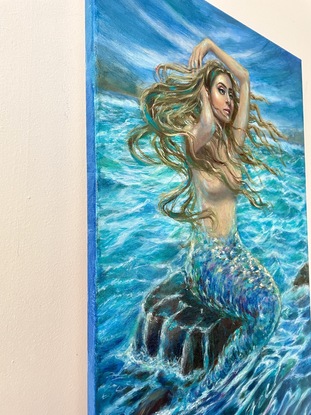 mermaid flowing long hair, mermaid sitting on a rock above the ocean water,  ocean with sparkling water,