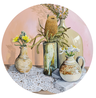 Four vases with flowers sitting on lace. 