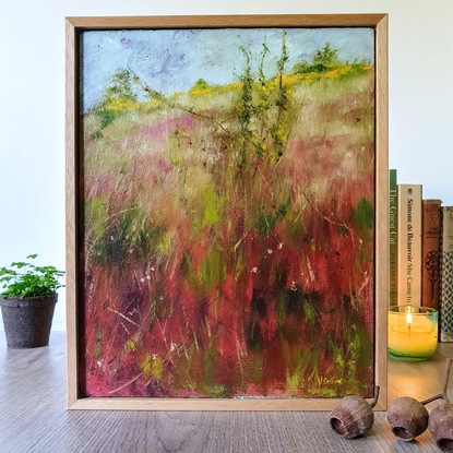 Small abstract impressionist landscape of grassy hill with maroon grasses and earthy tones, by Australian artist Victoria Collins.