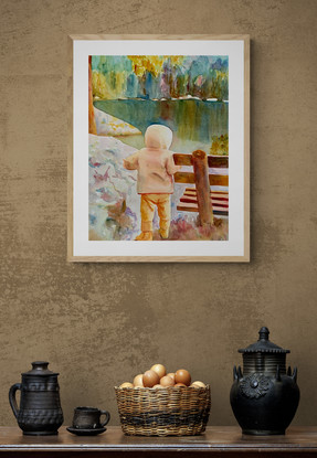 Child stands by a wooden bench.