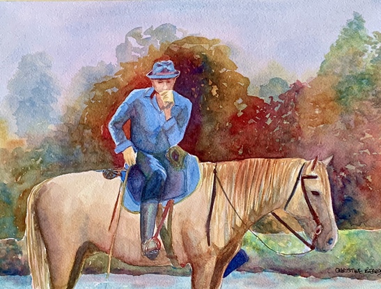 Rider watches his group of horses.