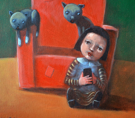 Girl with mobile phone and cats on the red chair