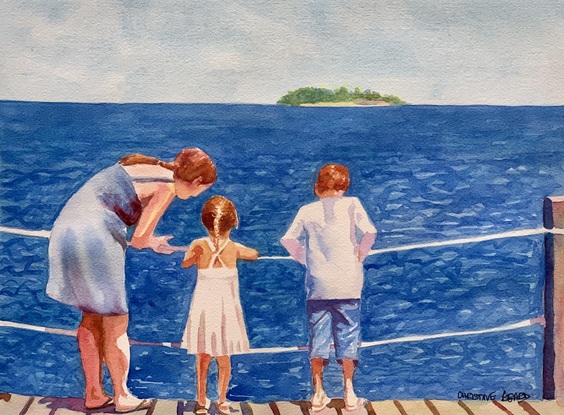 A family stands looking at the ocean.