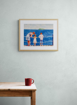 A family stands looking at the ocean.