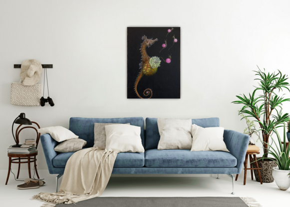 a composition of marble snails, a giving birth seahorse, and a flower in a dark environment.