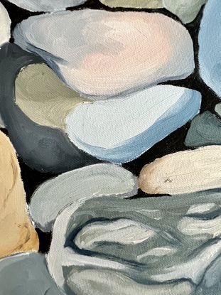 Mostly grey, but some other coloured pebbles clustered together