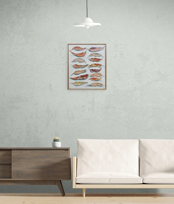 Two vertical rows of decaying gum leaves on a white background 