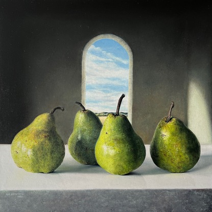 four green pears with dark background