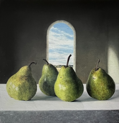 four green pears with dark background