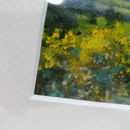 Miniature landscape of dark blue fields and hills with yellow wattle bushes, by Australian artist Victoria Collins