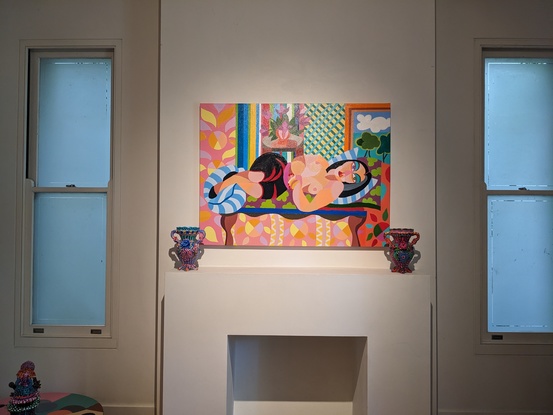 women relaxing in a patterned room