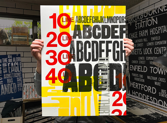 
The vibrant colour palette of yellow, red, black and silver bring the large format letterpress  print to life.  