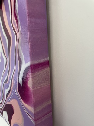 Purple, pink and white abstract flow painting.