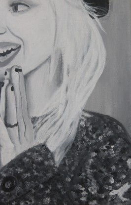 A black and white portrait of Hayley Williams (Paramore).