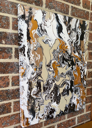 An abstract painting in neutral pallet with gold highlights depicting the meandering Australian Overland Outback