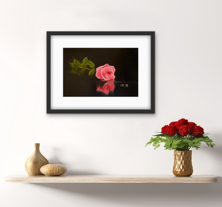 Rose and two ring on glass table 