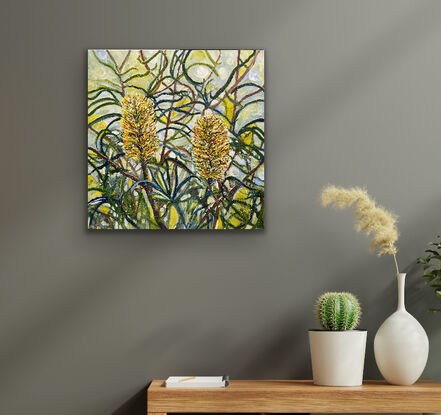 Brilliant yellow gold banksia against a misty background of branches and leaves.  The flowers glow with their golden colours against the pearly light of the early morning.  The leaves of the background are in all the shades of green and frame the beauty of the two flowers that leap off the canvas at you.  This is your own little piece of the Australian bush to have and enjoy in your home.

It is a taste of nature and the Australian bush to warm and decorate your home. This painting would look great in any room or office situation and would suit a natural frame. Please note that the painting is not framed but it can be arranged through Bluethumb.