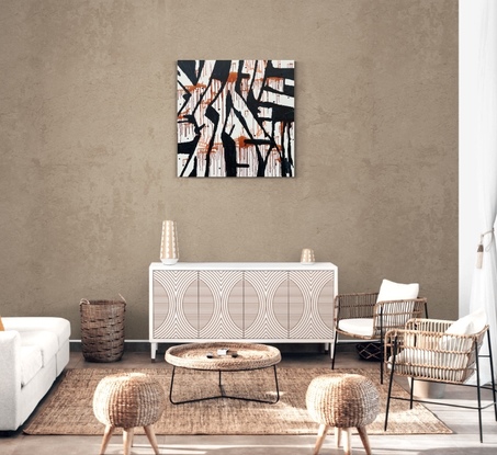 an organic  black linear pattern over burnt sienna earth coloured paint splatters.  