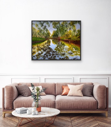 River reflecting surrounding gumtrees 