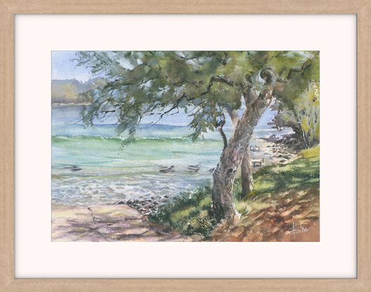 Watercolour painting of  the boat ramp at Bendalong Boat Harbour Beach, which is shadowed by the trees on the grassy area, the rocks around the corner and two ishing stations and 4 stingrays in the water.