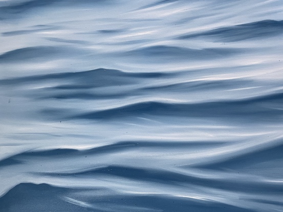 Smooth ocean surface with lots of movement 