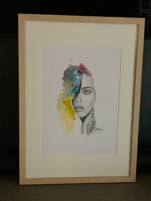 A drawing of a young woman with pops of color 