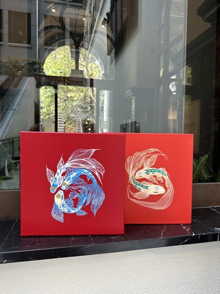 swirling koi fish floating on canvas