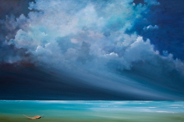 Dramatic and highly textured blue cloudscape over peaceful seascape with leaf suspending delicately over the water.