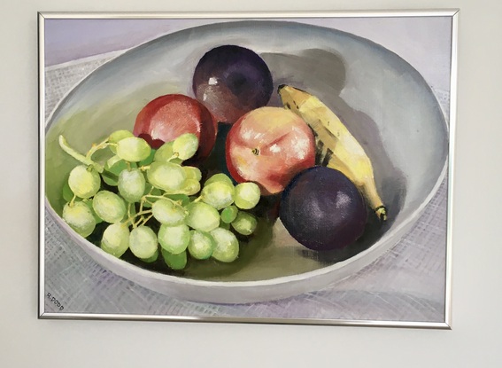 An attractive piece  which would look good in a kitchen/dining setting with an elegant aluminium frame