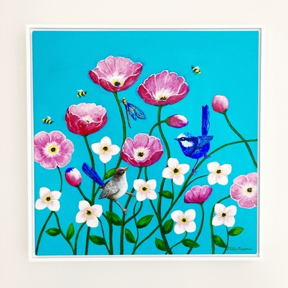 A group of happy pink poppies and smaller white flowers against a turquoise background. The poppies have open happy faces and a splendid blue wren and its mate relax on the stems of the poppies. A dragonfly rests on another stem and three litte bees hover between the flowers looking for nectar. The colours are largely turquoise, pink, white, blue and some yellow. The painting is framed in a white box frame.