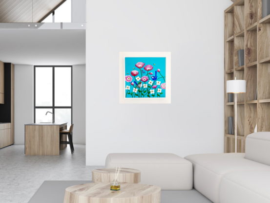 A group of happy pink poppies and smaller white flowers against a turquoise background. The poppies have open happy faces and a splendid blue wren and its mate relax on the stems of the poppies. A dragonfly rests on another stem and three litte bees hover between the flowers looking for nectar. The colours are largely turquoise, pink, white, blue and some yellow. The painting is framed in a white box frame.