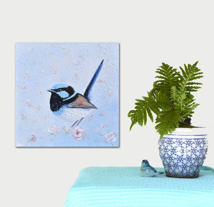 Thickly textured oil painting of a Superb Fairy Wren perched on a blossom branch. 