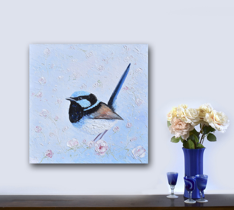 Thickly textured oil painting of a Superb Fairy Wren perched on a blossom branch. 