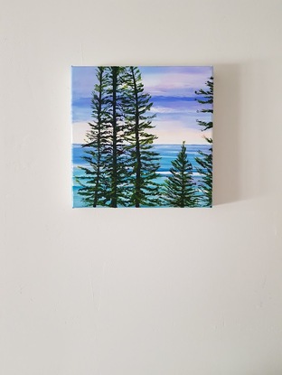 Norfolk Island pines turquoise waves sunset sky beach