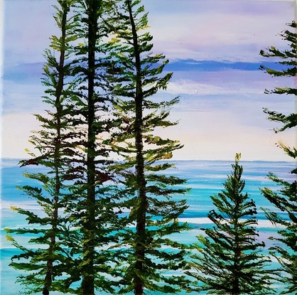 Norfolk Island pines turquoise waves sunset sky beach