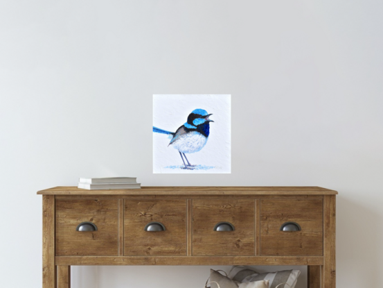 Thickly textured oil painting of a singing Superb Fairy Wren standing on a white background.